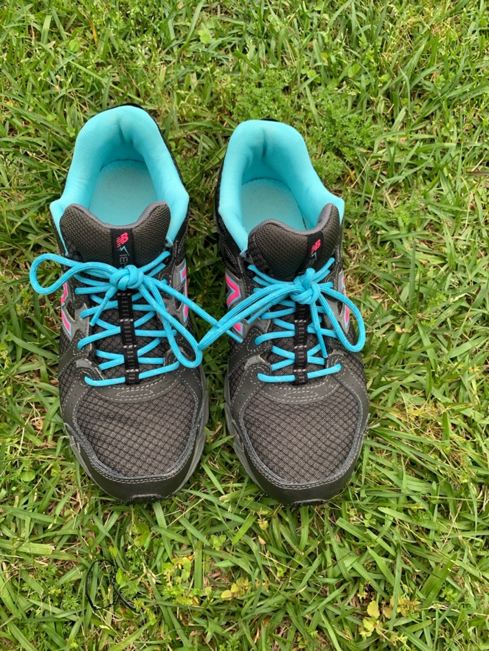 New Balance Women's Black Athletic Shoes with Turquoise Lining and Pink Logos
